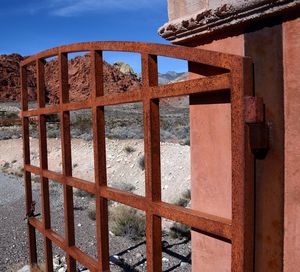 Close-up of metal structure against sky