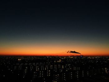 Aerial view of cityscape at night
