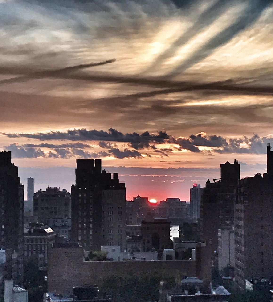 architecture, building exterior, sunset, built structure, city, sky, cityscape, travel destinations, cloud - sky, skyscraper, no people, outdoors, nature, day