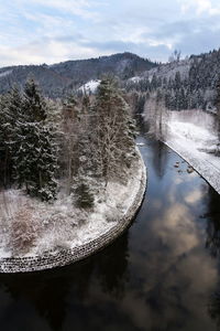 High angle view of lake against sky during winter