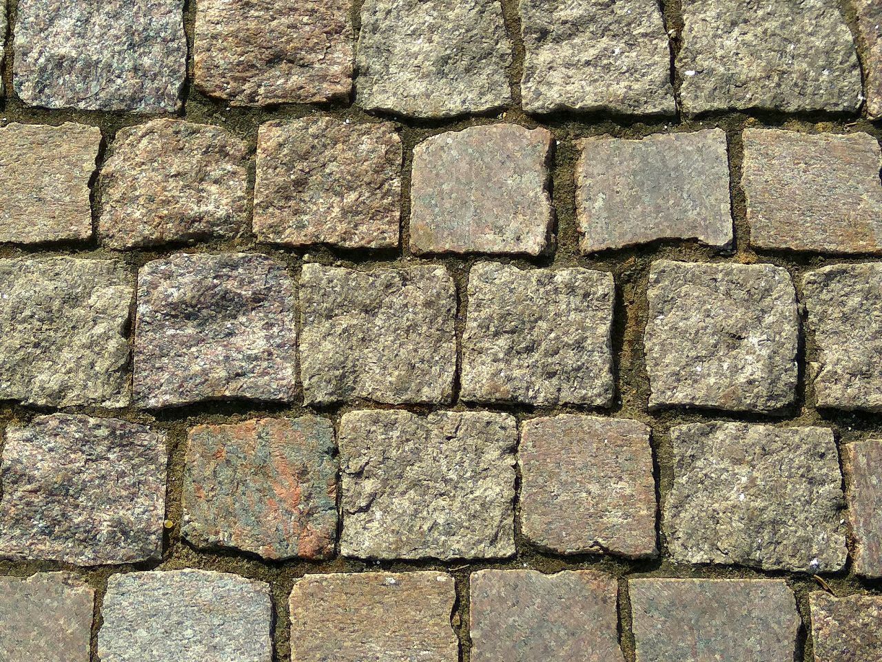 backgrounds, full frame, textured, pattern, no people, repetition, wall, day, brick, footpath, stone material, gray, rough, close-up, solid, in a row, outdoors, arrangement, architecture, paving stone, stone wall, concrete