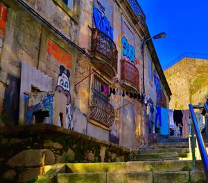 Low angle view of graffiti on building wall