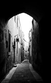 Narrow alley along buildings