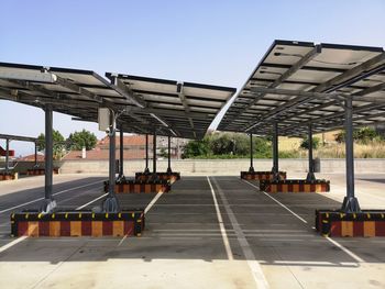 Parking spaces covered with solar panels at the shopping center