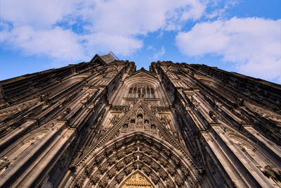 Low angle view of cologne cathedral against sky