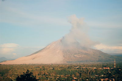 Panoramic view of volcanic landscape against sky