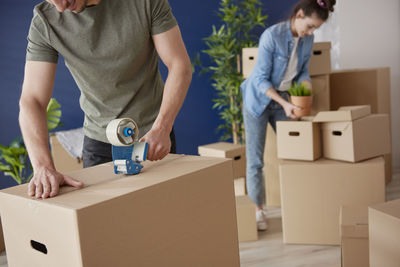 Rear view of people standing in box