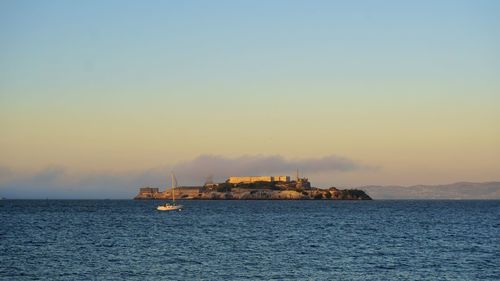 Scenic view of sea against sky during sunset