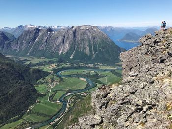 Panoramic view of landscape and mountains against clear sky