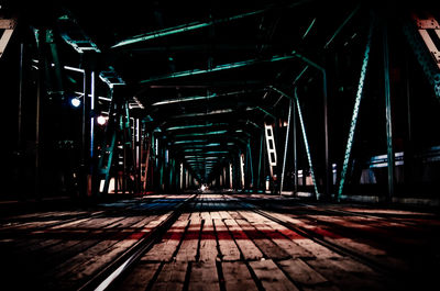 Illuminated railroad station at night