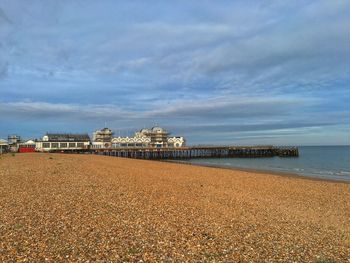 Scenic view of sea against cloudy sky