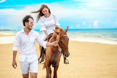 Friends on shore at beach