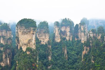 Panoramic view of rock formations against sky