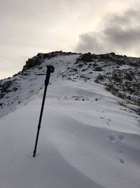 Snow covered mountain against sky