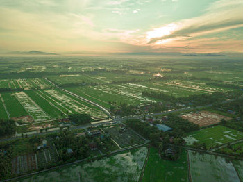 High angle view of buildings against sky during sunset