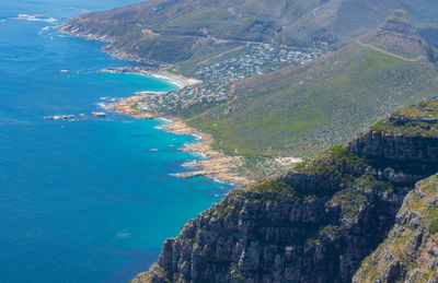 High angle view of townscape by sea