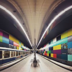 Interior of illuminated railroad station