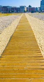 Surface level of wooden walkway on beach