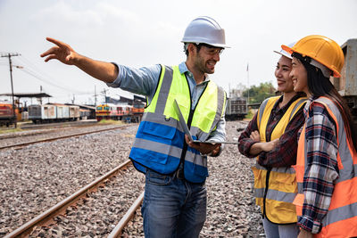 People working on railroad track