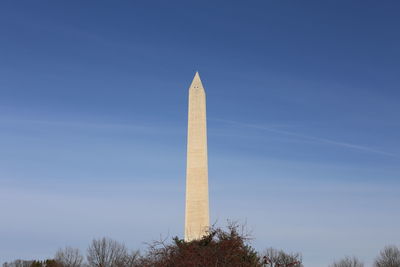 Low angle view of monument against blue sky