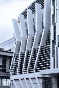 Low angle view of modern buildings against sky