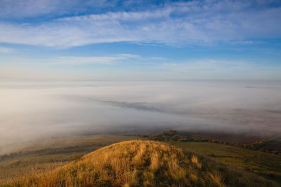 Scenic view of land against sky