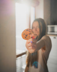 Portrait of woman holding ice cream