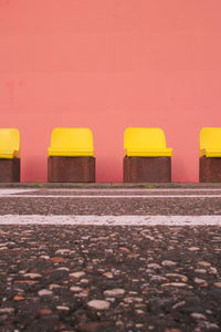 Multi colored yellow wall against clear sky during sunset