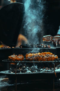 Close-up of meat on barbecue grill