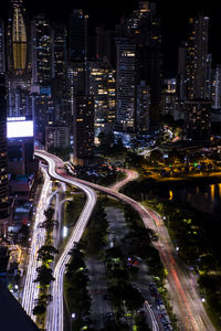 High angle view of illuminated city street at night