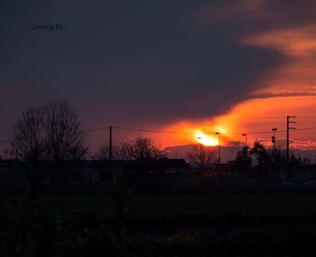 Scenic view of landscape against sky at sunset