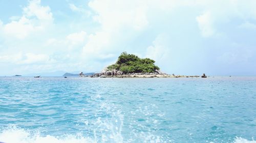 Scenic view of sea against blue sky