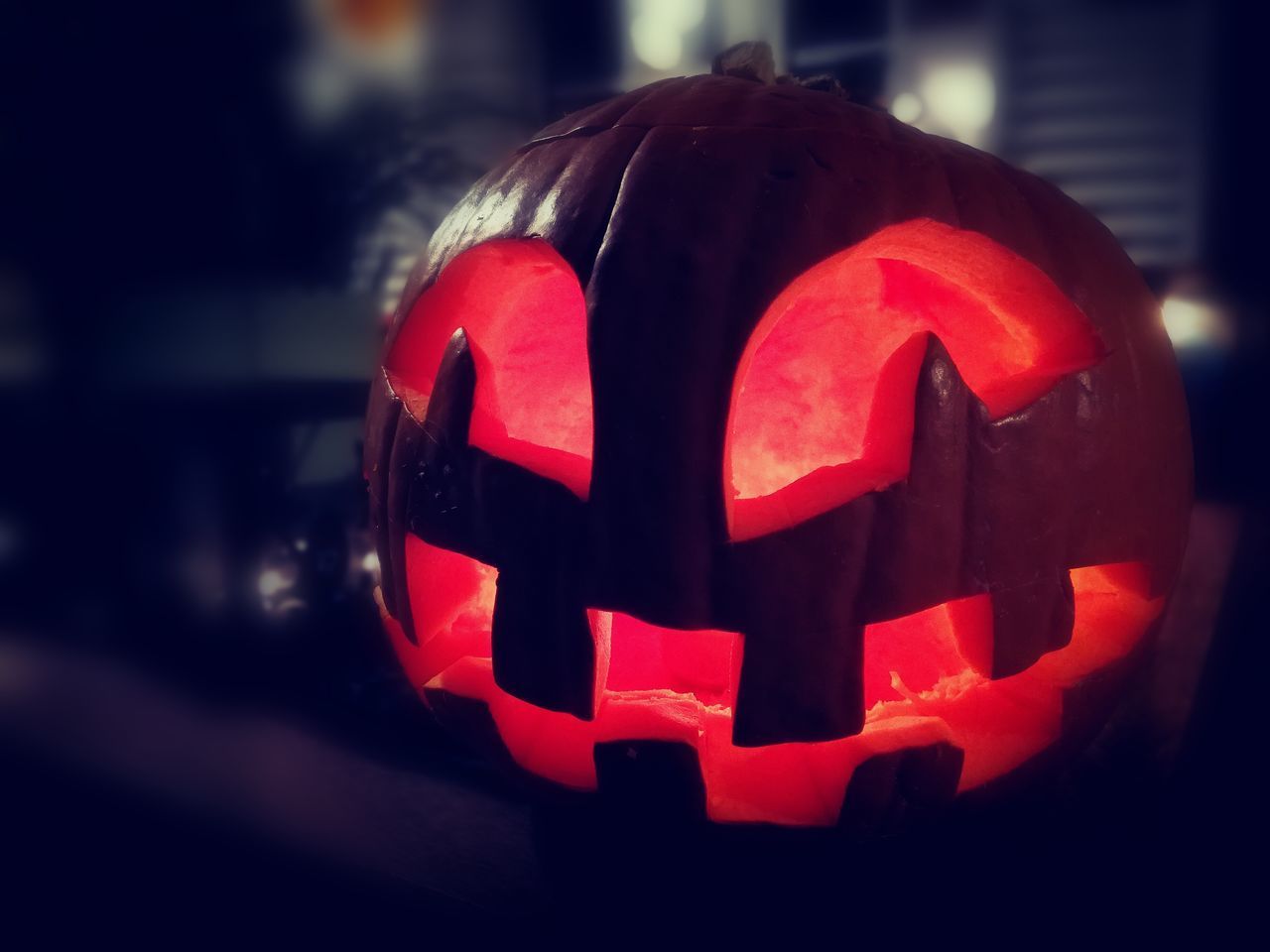 CLOSE-UP OF ILLUMINATED PUMPKIN HALLOWEEN