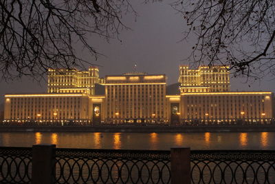 Illuminated buildings at waterfront