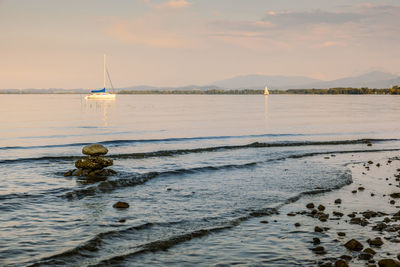 Scenic view of sea against sky during sunset