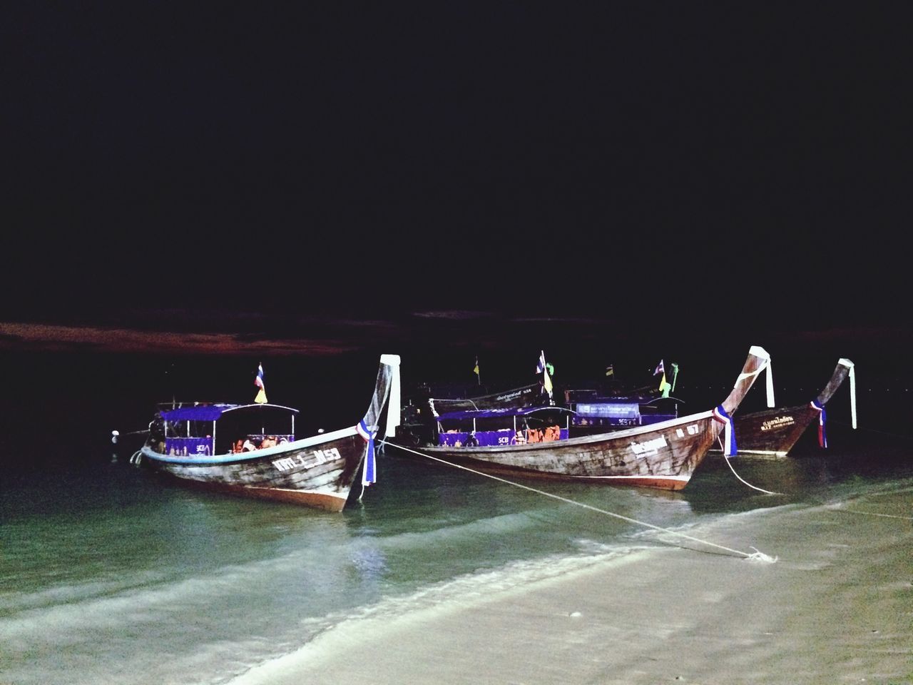 nautical vessel, transportation, mode of transport, boat, water, sea, moored, clear sky, copy space, beach, shore, travel, sand, waterfront, nature, tranquility, outdoors, tranquil scene, beauty in nature, scenics