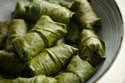 Closeup stuffed patience dock leaves with beef, rice and vegetables