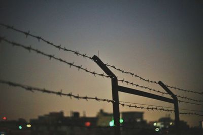 Chainlink fence at sunset