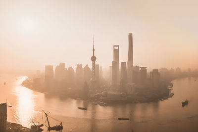 View of buildings in city at waterfront