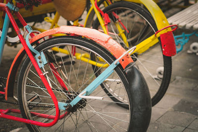 Close-up of bicycle parked on street