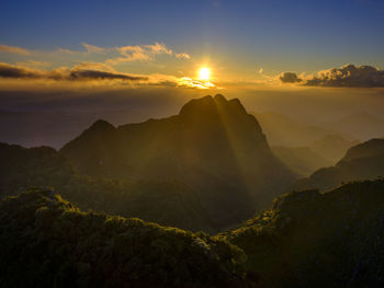 Scenic view of mountains against sky during sunset