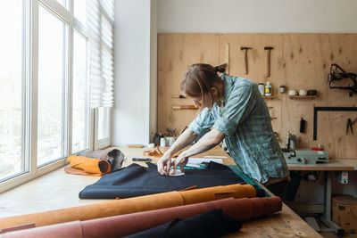 Woman working on table