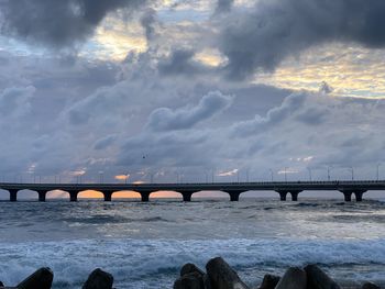 Bridge over river against sky