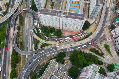 Aerial view of vehicles on road in city