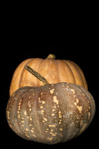 Close-up of apple against black background