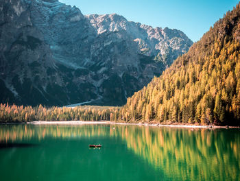 Scenic view of calm lake in mountains