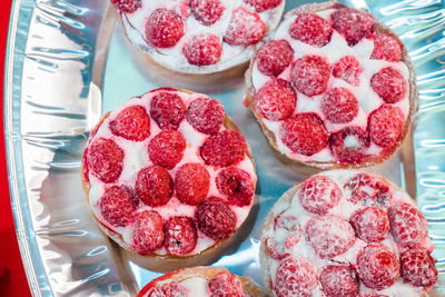 High angle view of cake with fruits for sale