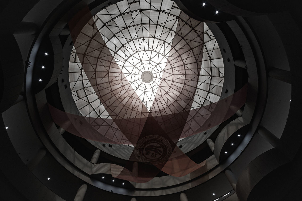 LOW ANGLE VIEW OF ILLUMINATED SKYLIGHT