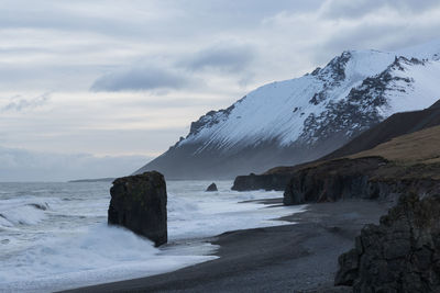 Scenic view of frozen sea against sky