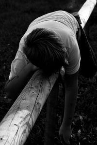 Rear view of child on field